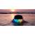 Boompods Soundflare Ocean bluetooth speaker floating in water with beat driven lights