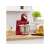 Bosch MUMS2ER01 red kitchen machine with stainless steel bowl on countertop