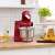 Bosch MUMS2ER01 red kitchen machine with stainless steel bowl on countertop