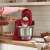 Bosch MUMS2ER01 red kitchen machine in use