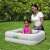 A woman and child playing in the Bestway inflatable pool