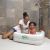 Mother bathing child in Bestway inflatable baby tub in bathroom, square baby tub