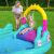 Child sliding on Bestway Unicorn Inflatable Play Center