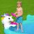 Child playing ring toss on Bestway Unicorn Inflatable Play Center