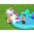 Child playing in the Bestway Magic Unicorn inflatable pool with slide and basketball hoop