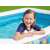 Girl enjoying the Bestway inflatable family pool with flower pattern