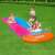 Kids having fun on the Bestway Ho Go! 488 cm inflatable water slide with llama floats