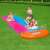 Kids having fun on the Bestway Ho Go! 488 cm inflatable water slide with llama floats