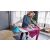 Woman ironing clothes with Philips PerfectCare Compact Plus steam generator iron