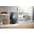 Philips FC9555/09 5000 Series bagless vacuum cleaner stored in a shelf