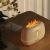 RetroFlame aroma diffuser with flame effect on a desk