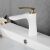 Rea Orbit Low White and Gold Faucet Installed on Sink
