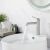 Rea Foss brushed nickel bathroom faucet in use