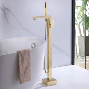Rea TERY gold floor mounted bathtub faucet in bathroom setting - Rea Faucet