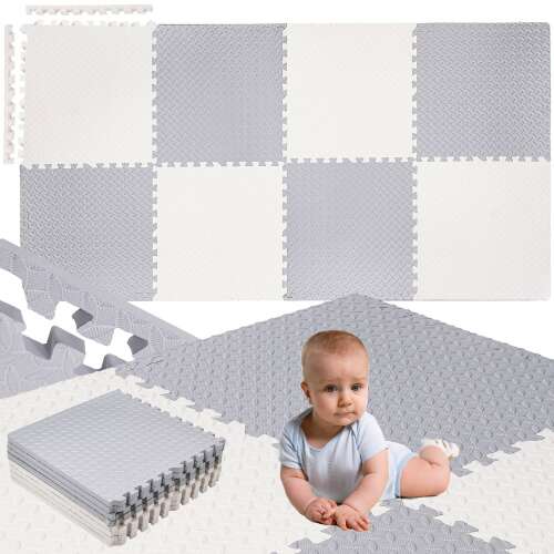 Baby auf Springos creme und grauer Schaumstoff Puzzle Spielmatte