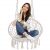 Woman sitting comfortably in Springos macrame hanging chair