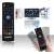 Pepita multifunction smart remote control with keyboard MX3, black, usage example, hand holding the remote control, TV screen in the background