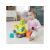 Baby spielt mit Fisher-Price Abrissbagger Spielzeug