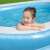 Bestway 54006 Familien-Aufstellbecken, 262 x 175 x 51 cm, blau und weiß, Kind spielt im Pool