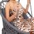 Close-up of woman in Springos grey macrame hanging chair
