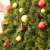 Christmas tree decorated with Mercaton® gold ornaments