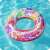 Bestway 91cm inflatable swim ring with colorful mandala design, two handles, floating in a pool