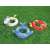 Bestway inflatable swim rings for kids, set of 3: unicorn, whale, and parrot, on grass