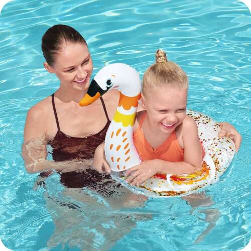 Child using Bestway swan glitter pool float