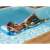 Man relaxing on Bestway Bissfull Drifter inflatable pool float with tropical leaf print