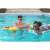 Two people relaxing on Bestway 44033 inflatable pool floats with tropical leaf print