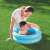 Bestway 51061 inflatable pool, blue, with a child playing in it