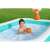 Child playing basketball in Bestway Dunk 'N Splash inflatable family pool