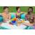 Close-up of Bestway Sippin' Summer inflatable pool table, turquoise and white, with drink holders and snacks