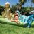 Kids playing in Intex Jurassic Park Inflatable Pool with Dinosaurs