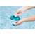 Hand putting chlorine tablet into Bestway Flowclear floating chemical dispenser for pool