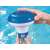 Hand holding Bestway Flowclear floating chemical dispenser for pool, blue and white, 2.5 cm tablets