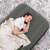Person sleeping on a Bestway single air mattress, 188 x 99 x 25 cm, grey, indoors