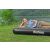 Bestway inflatable mattress single size being used outdoors by a lake