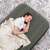 Person sleeping on a Bestway single air mattress, 188 x 99 x 25 cm, grey, indoors