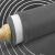 Close up of a silicone rolling pin on a pastry mat with measurements
