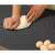 Using the non-stick silicone baking mat to knead dough