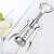 Westmark 6020 lever corkscrew, chrome, axial threaded, next to a glass of wine