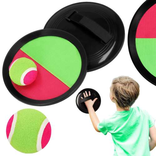 Springos Catching Game, Two catching discs with a ball in the middle, child playing with the game