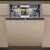 Whirlpool W8I HF58 TU built-in dishwasher, open door, interior view