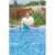 Man using Bestway pool surface skimmer