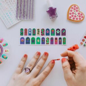 Make It Real Glitter Girls Nail Party set in use, applying nail polish and stickers - Vanity Table, Makeup Set, Fragrance