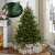 Timeless Tools artificial Christmas tree decorated in a living room setting