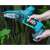 Dedra 18V cordless chainsaw in use, cutting a tree branch, 10cm, 4 inch, blue, electric, pruning saw, branch cutter, tree trimming, garden tool