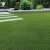 Malaga 2cm zöld műfű kertben, 400cm széles, kültéri használatra