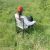Woman sitting in Trizand camping chair outdoors